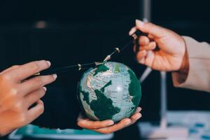 Carbon offset price report CO2 emission. Future growth Net zero waste in ESG ethical SME office protect climate change global warming social issues project. Group of asia people Eco friendly SDGs plan photo