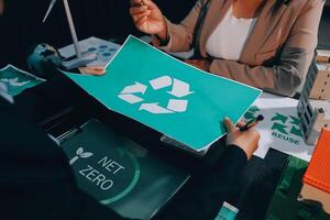 Carbon offset price report CO2 emission. Future growth Net zero waste in ESG ethical SME office protect climate change global warming social issues project. Group of asia people Eco friendly SDGs plan photo