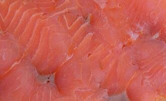 Red salmon fish as background macro photo. photo