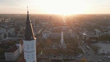 Siauliai, Lithuania - 12th november, 2024 - aerial zoom out view Roman catholic Church of Saints Peter and Paul. Siauliai city landmarks and sightseeing attractions video