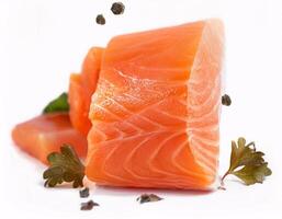 Pieces of fresh raw salmon floating in the air, isolated on white background photo