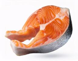 Pieces of fresh raw salmon floating in the air, isolated on white background photo