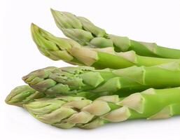 Asparagus isolated on a white background, showing slender fresh green stems photo