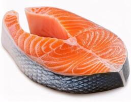 Pieces of fresh raw salmon floating in the air, isolated on white background. photo