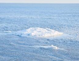 Beautiful view of the sea salt expanse on the beach with a bright atmosphere. Clean blue sky photo