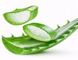 Falling aloe vera in slice shape, isolated on white background and sharp clipping path photo