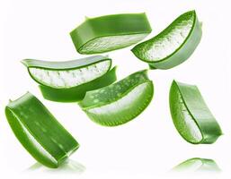 Falling aloe vera in slice shape, isolated on white background and sharp clipping path photo