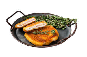 Cordon bleu chicken fillet cutlet with ham and cheese. Dark background. Top view png