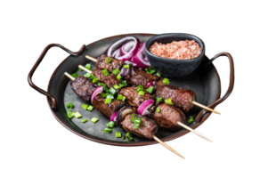 Kebabs grilled meat skewers, shish kebab with onion and herbs, grilled beef meat. Wooden background. Top view png