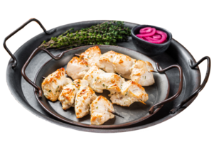 Grilled Chicken shish kebab with herbs and onion. Orange background. Top view png