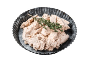 Canned Cod liver with thyme in oil on plate. Black background. Top view png