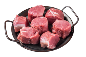 Raw pork tenderloin medallions steaks. Gray background. Top view. Copy space png
