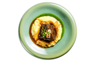Beef tenderloin steak with mashed potatoes. White background. Top view. Copy space png