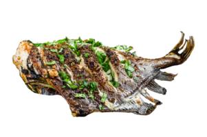 Fried Dory fish with lime and parsley in a pan. Vegatarian health food. Gray background. Top view png