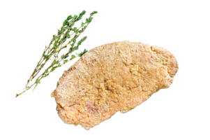 Homemade raw breaded German Weiner Schnitzel. Black background. Top view png