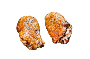 Grilled duck breast fillets in a frying pan. Black background. Top view png