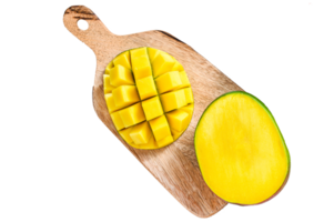 Mango fruit cut into cubes on a cutting Board. Gray background. Top view png