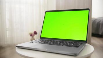 Laptop with Green Screen Display in Dolly Zoom Effect video