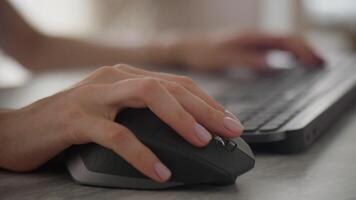 Close-up of Hand Using a Computer Mouse and Keyboard video