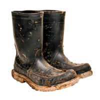 Muddy black rubber boots isolated on a transparent background png
