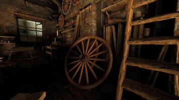 Old workshop interior with wooden wheel and tools in a rustic setting video