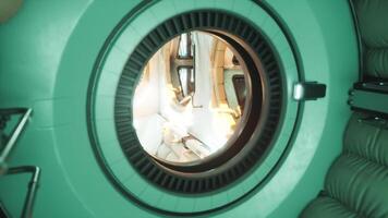 Interior view of a futuristic space station in orbit with a circular window video