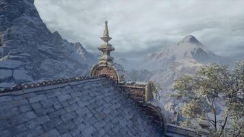 Mountain view from ancient rooftop in a tranquil landscape setting video
