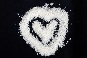 rice isolated on black background photo