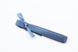 Beautiful blue ribbon on white background with clipping path. photo