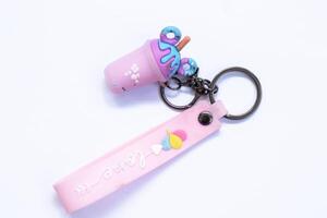 character keychain on white background top view photo
