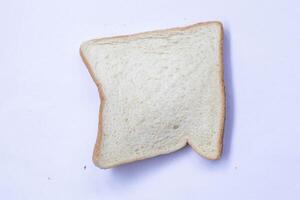 Slices of toast isolated on white background. Top view, flat photo
