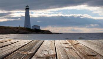 close-up of rustic wooden boards on a dock with a scenic lighthouse and cloudy sky in the background photo