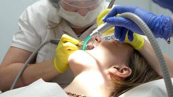 Close-up of denture fitting during a dental procedure with a gloved hand video