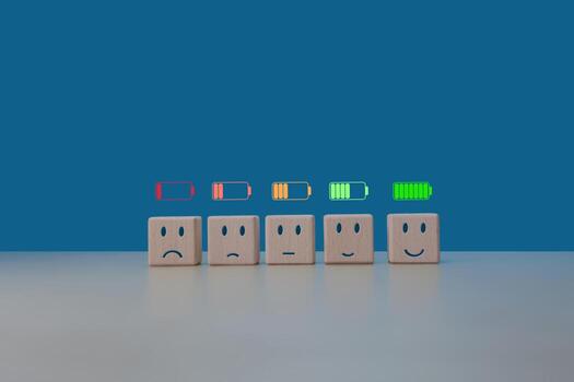 Battery capacity level from low to high with mood from sad to happy photo