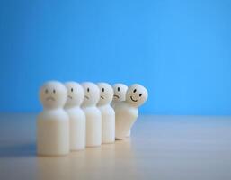 Smiling people with sad people. Positive thinking concept photo