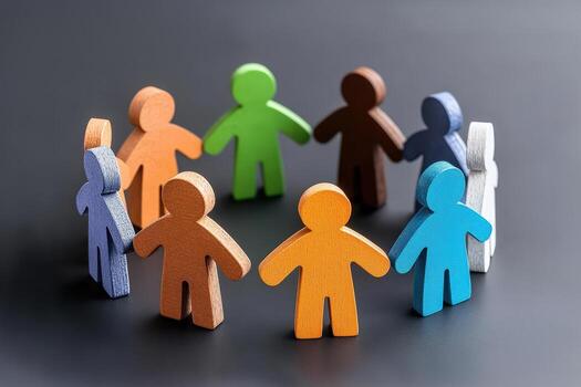Colorful figures symbolize unity and diversity in a collaborative environment. photo