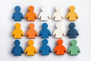 Colorful wooden figures arranged in a grid, representing diversity and unity. photo
