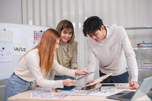 Application development team Brainstorming meeting and discussion to plan the design of ux ui and develop the system of applications on smartphones photo