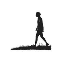 Silhouette of a man walking in the grass vector