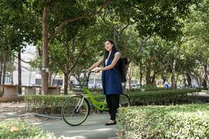 Promoting clean energy by riding bicycles in urban parks to reduce pollution green spaces lifestyle joyful experience photo