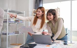A team of designers helps develop the application system. Brainstorm ideas for making ux ui to develop programs photo