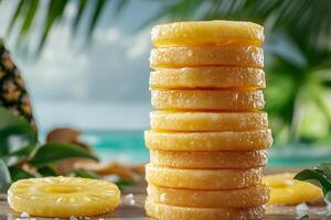 A stack of pineapple slices on a wooden table photo