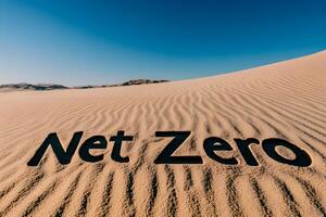Net Zero in the Desert A stark and powerful visual message written in the sand photo