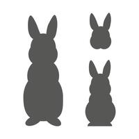 Rabbit silhouettes collection. Standing, sitting bunny and rabbit head illustration for Easter decorations vector