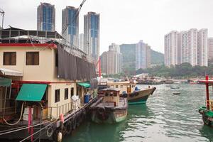 Floating village in the Aberdeen bay in Hong Kong photo