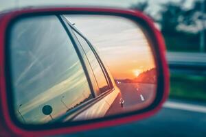 Sunset reflection in the rear view mirror photo