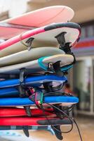 Surf boards in a stack photo