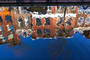 House reflection in the canal of Delft photo