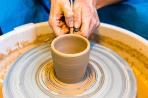 Pottering - creating a clay cup in process photo