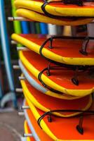 Surf boards in a stack photo